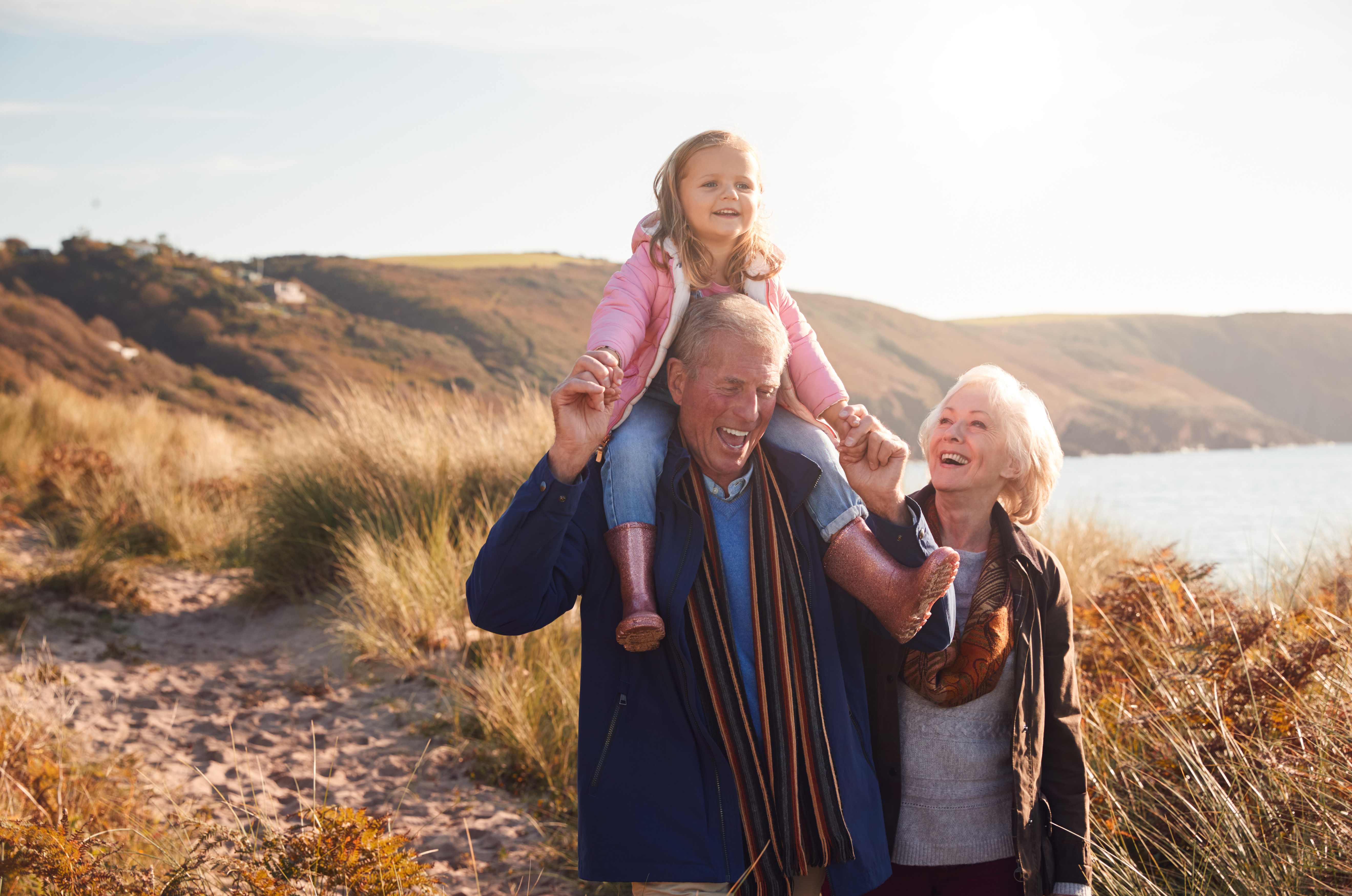 Grandparents On Walk With Child