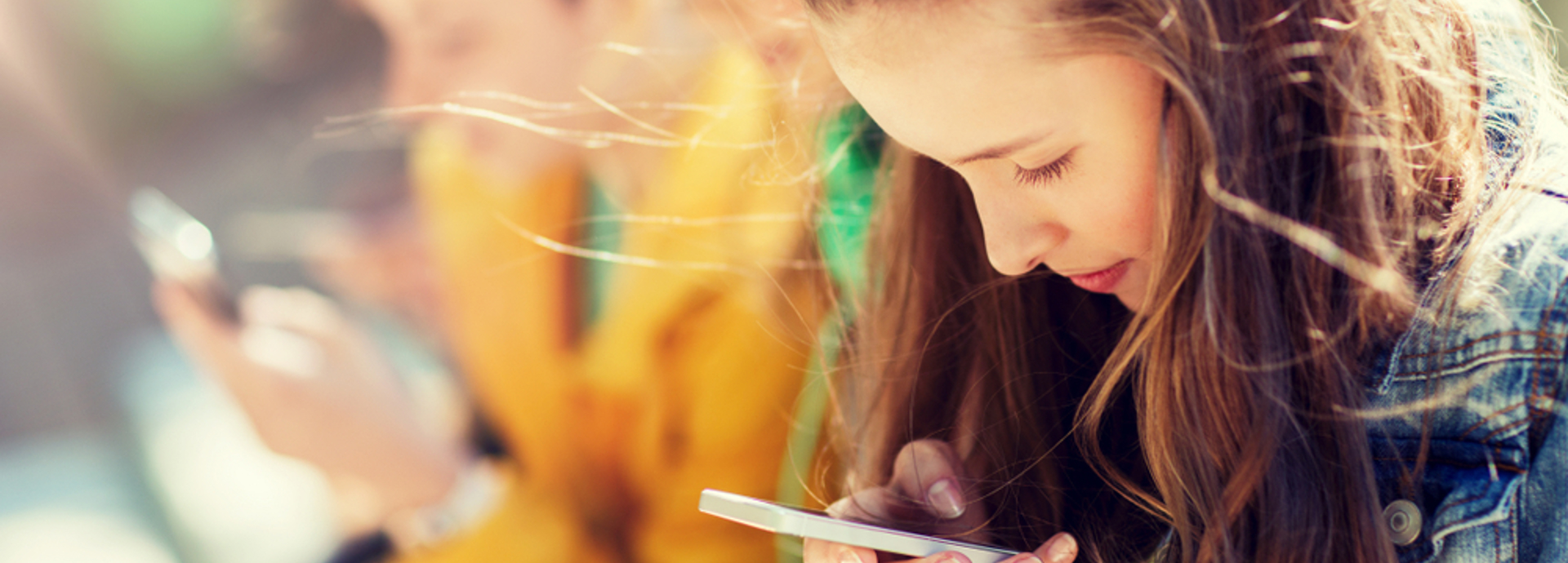 teenagers on their smartphones